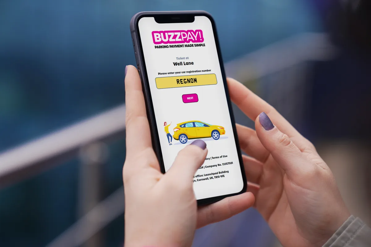 Entering a vehicle registration on the BuzzPay phone screen
